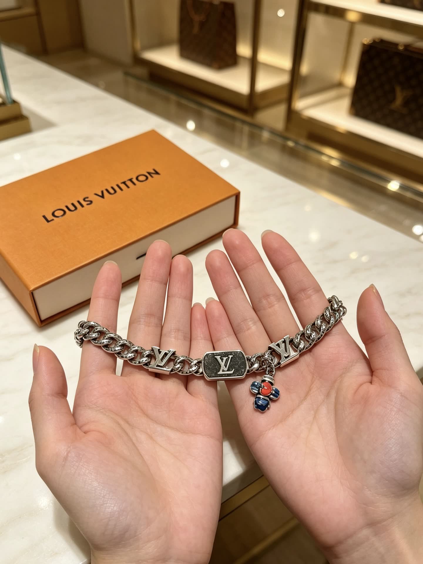 Louis Vuitton Silver Bracelet with Monogram Charms